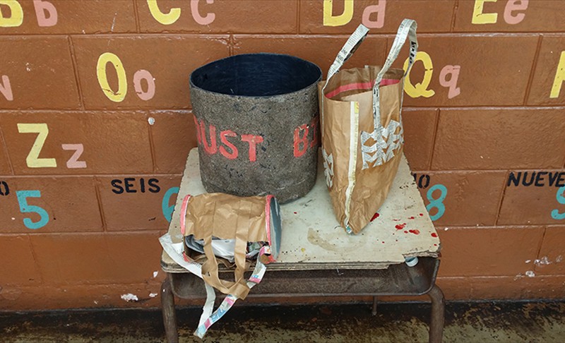 Handbags made from recycled newspaper and paper bags dust bin decorated with sand